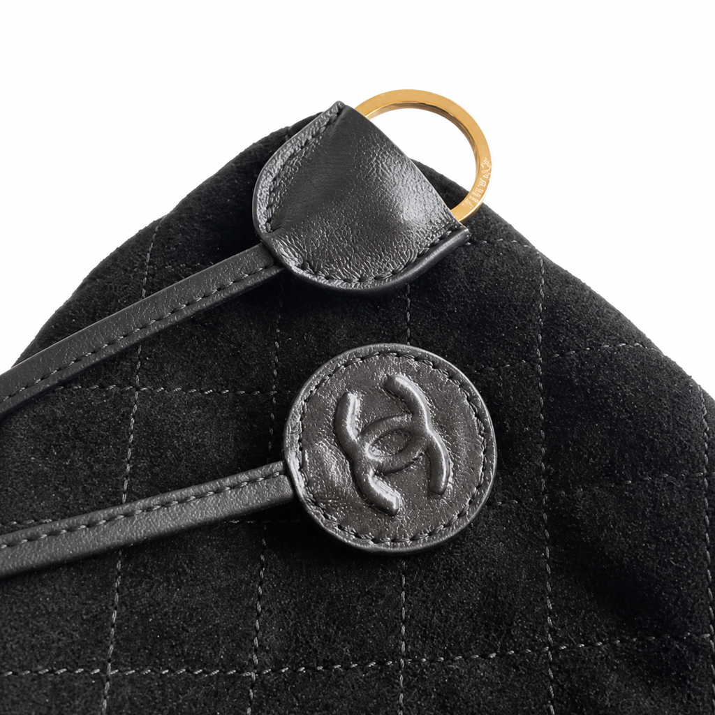 Chanel Black Quilted Suede Drawstring Bucket Bag | Gold CC Charm & D-Ring — 22cm