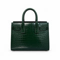 YSL Sac de Jour Small Bag in forest green croc-embossed glossy leather with silver hardware and dual rolled top handles, front view