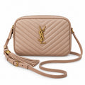 Saint Laurent YSL Lou Camera Bag in Blush Pink Rose Nude Powder Rose Quilted Lambskin with Aged Antique Gold YSL Monogram Chevron Quilting Blush Leather Tassel and Adjustable Strap