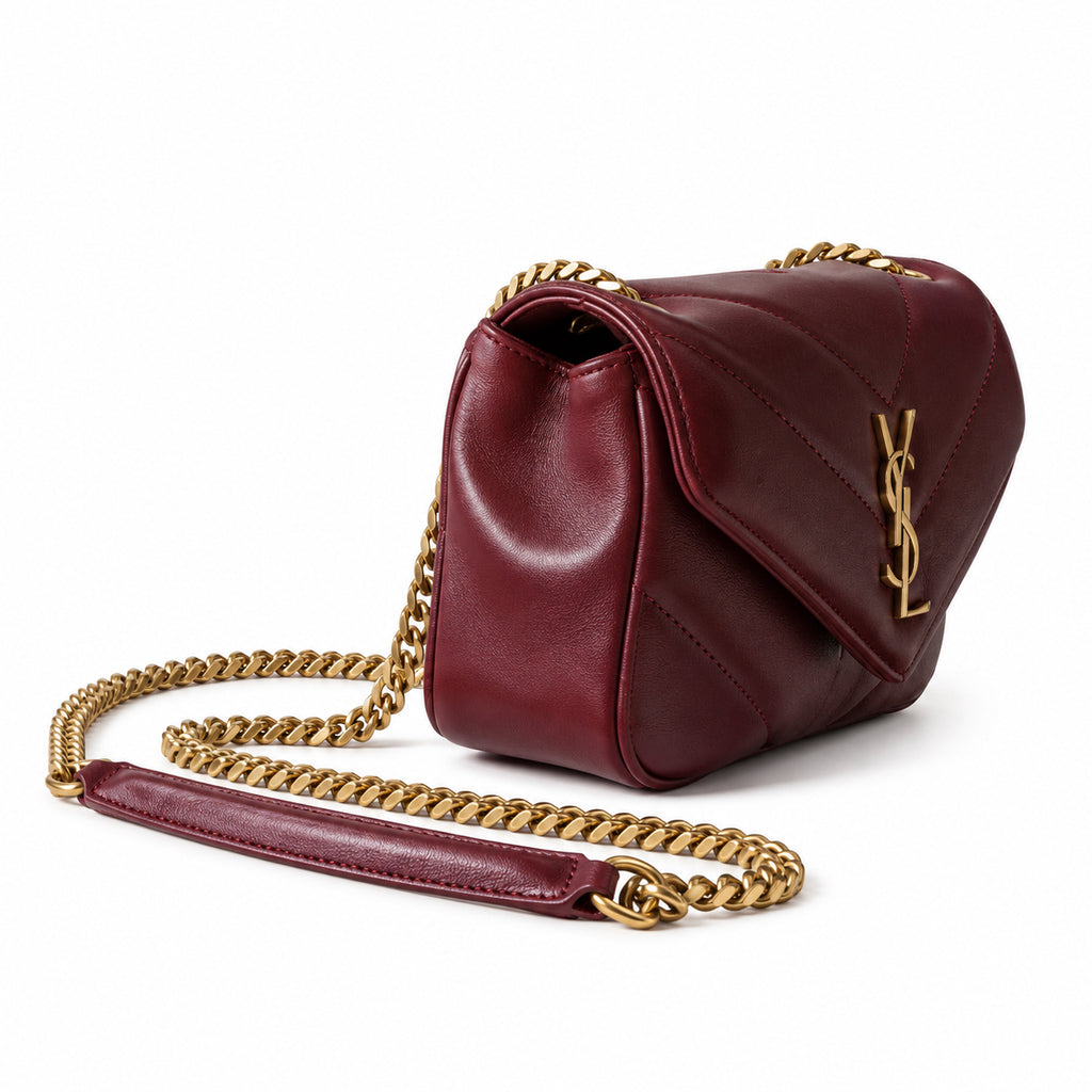 YSL Loulou Mini Chain Bag in burgundy quilted leather with gold hardware, side angle view