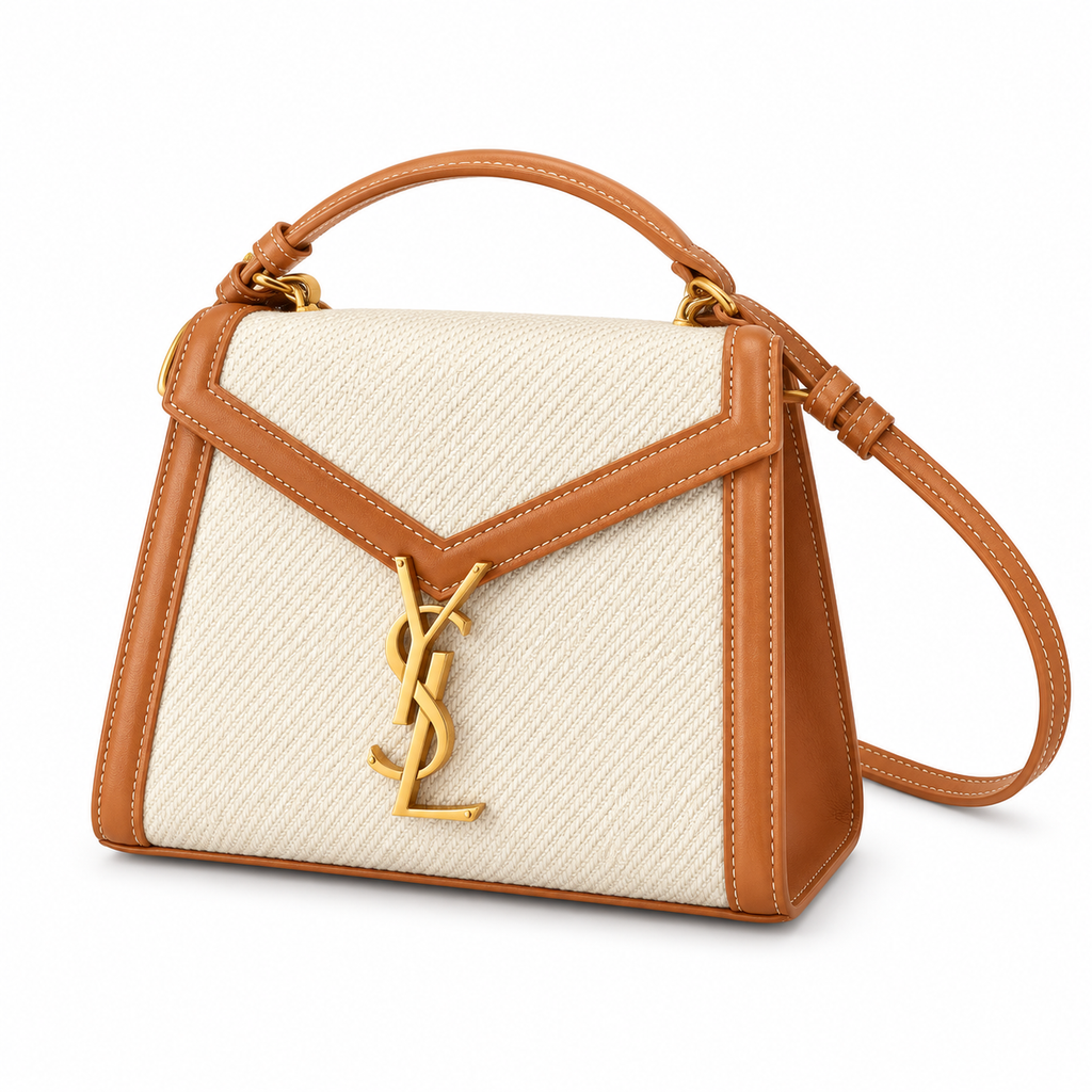 Saint Laurent YSL Cassandre Mini Top Handle Bag in Natural Ivory Canvas with Tan Caramel Calfskin Leather Trim Shiny Gold Oversized YSL Monogram Charm and Removable Leather Shoulder Strap