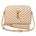 Saint Laurent YSL Lou Camera Bag in Powder Beige Nude Blush Quilted Lambskin Leather with Shiny Gold YSL Monogram Chevron Quilting Powder Leather Tassel and Adjustable Strap