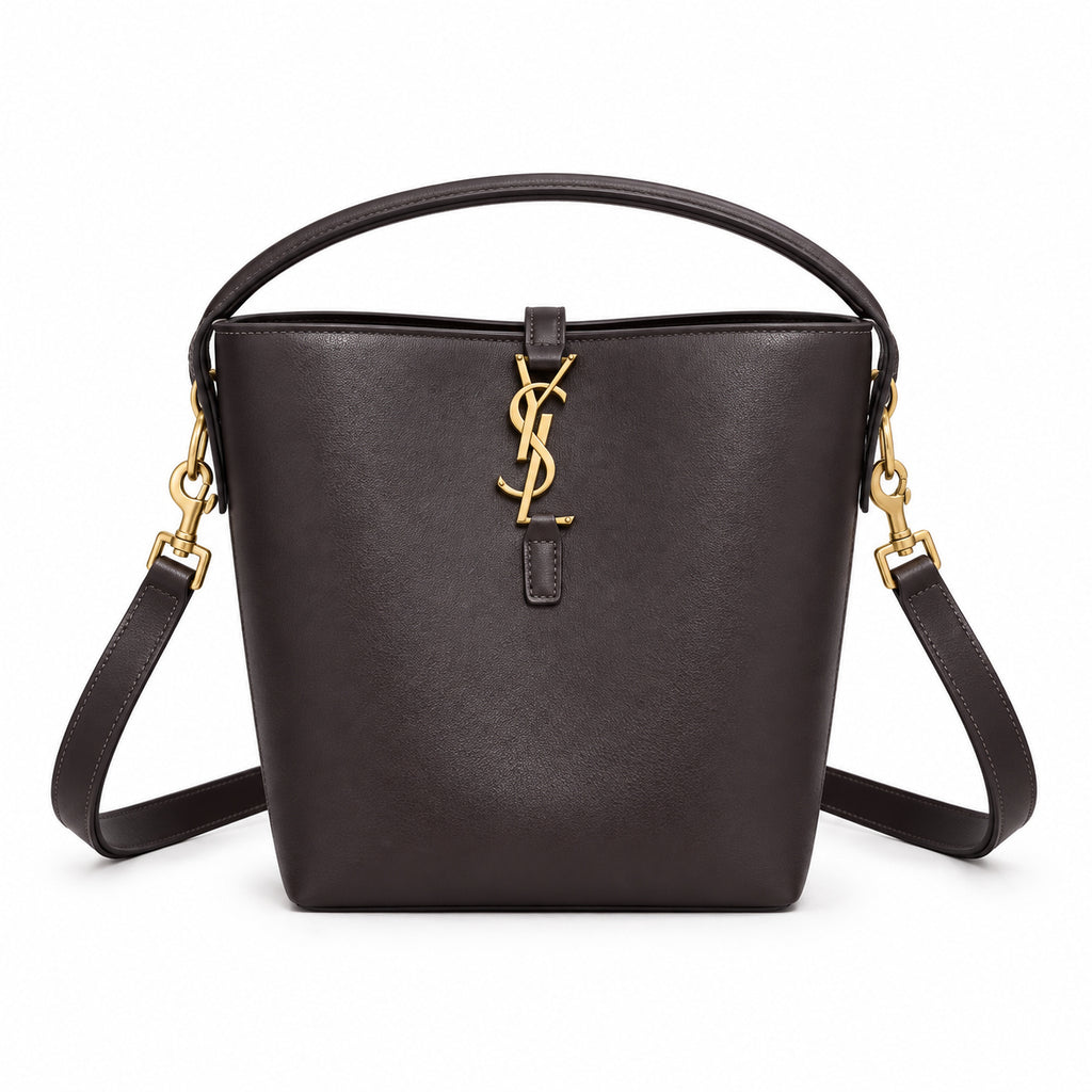 YSL Le 37 Bucket Bag in dark brown smooth leather with gold YSL cassandre monogram charm, top loop handle and wide adjustable crossbody strap, front view