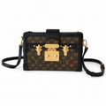 Louis Vuitton Petite Malle box bag in Monogram canvas with gold trunk hardware and black leather trim